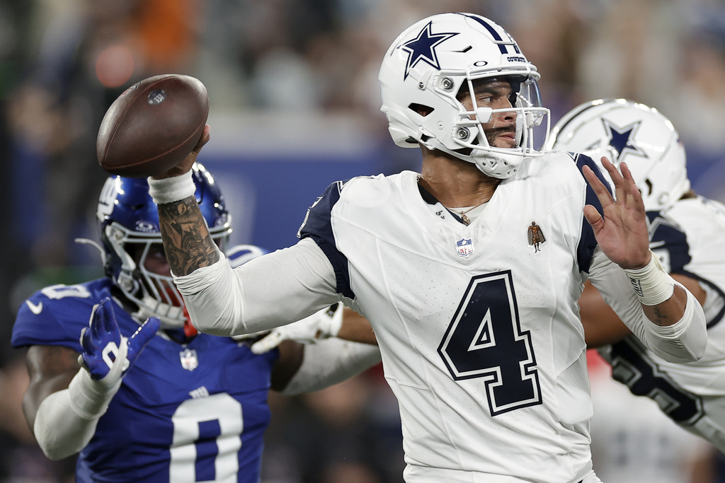Dak Prescott throws 2 TD passes and Cowboys win 7th straight over