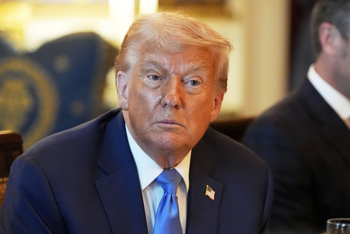 The Latest: Trump delays tariff implementation another month