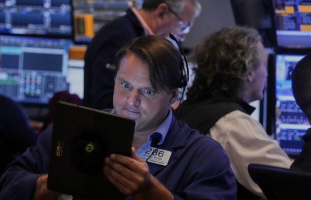 Wall Street holds steady just below recent records Wall Street holds steady just below recent records