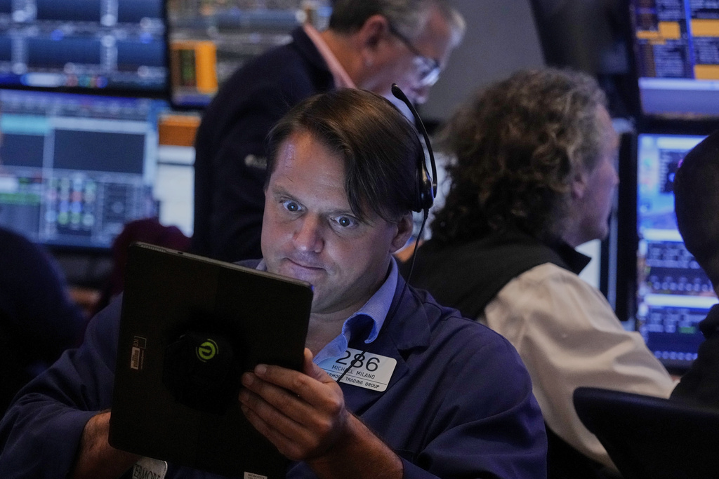 Wall Street holds steady just below recent records