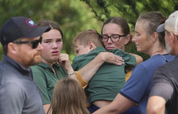 A shooting at a Minneapolis Catholic school kills 2 children, injures 17 people