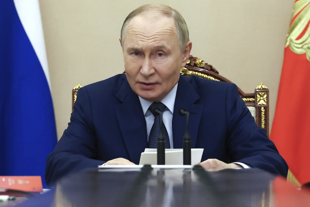 Putin says Russia will stick to nuclear arms limits for one more year after treaty with US expires