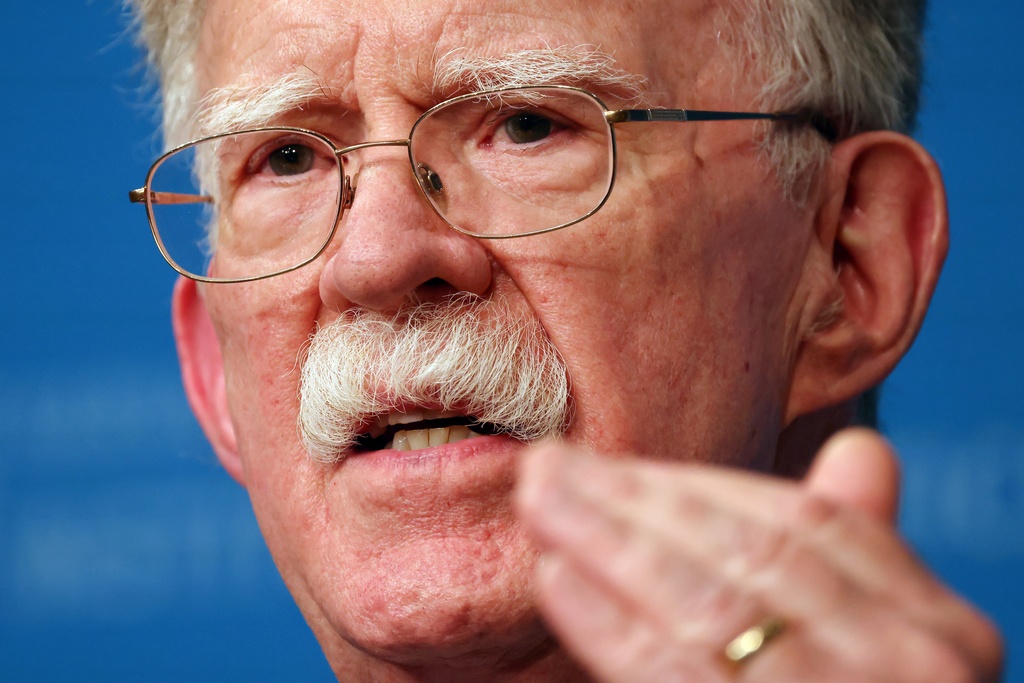 Ex-Trump national security adviser Bolton charged with storing and sharing classified information Ex-Trump national security adviser Bolton charged with storing and sharing classified information