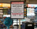 A sign in a Kwik Trip store shows the store will no longer be using pennies to give change, on Oct. 23, 2025, in Yorkville, Wis. (AP Photo/Morry Gash)