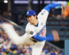 Los Angeles Dodgers pitcher Shohei Ohtani (17) delivers a pitch against the Toronto Blue Jays during fourth inning Game 4 World Series playoff MLB baseball action in Los Angeles on Tuesday, Oct. 28, 2025. (Frank Gunn/The Canadian Press via AP)