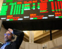 Options trader Steven Rodriguez works on the floor at the New York Stock Exchange in New York, Wednesday, Oct. 29, 2025. (AP Photo/Seth Wenig)