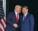 President Donald Trump, left, and Chinese President Xi Jinping, right, shake hands after their U.S.-China summit meeting at Gimhae International Airport Jinping in Busan, South Korea, Thursday, Oct. 30, 2025. (AP Photo/Mark Schiefelbein)