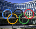 FILE -Olympic Rings are pictured in front of The Olympic House, headquarters of the International Olympic Committee (IOC) at the opening of the executive board meeting of the International Olympic Committee (IOC) in Lausanne, Switzerland, March 28, 2023. (Laurent Gillieron/Keystone via AP, File)