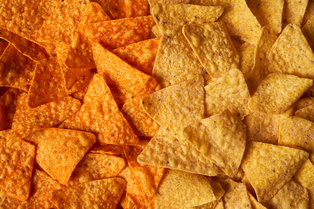 Doritos and Cheetos dial back the bright orange in new versions without artificial ingredients