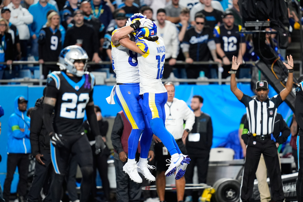 Stafford’s late TD pass to Parkinson lifts the Rams past the Panthers 34-31 in tense playoff opener Stafford’s late TD pass to Parkinson lifts the Rams past the Panthers 34-31 in tense playoff opener