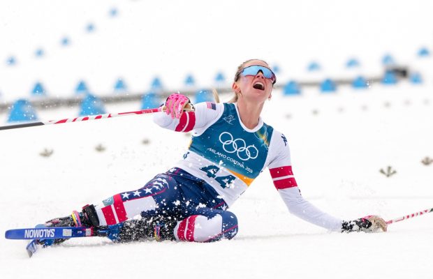 Jessie Diggins fights injury to take bronze in race dominated by Sweden at Milan Cortina Games