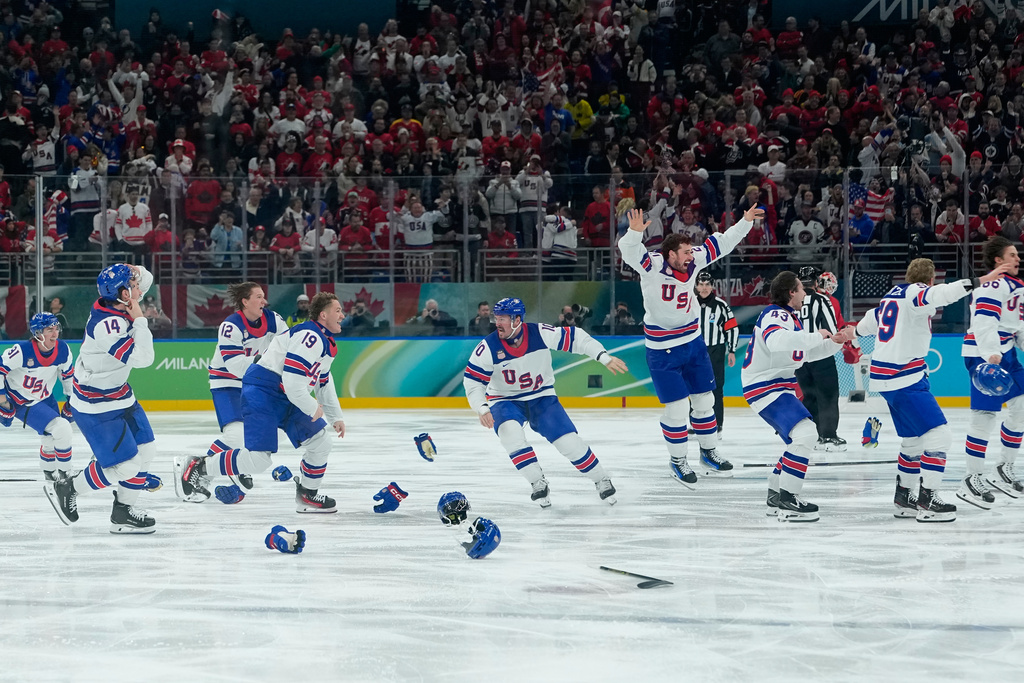 Hughes scores in overtime as US beats Canada for first men’s hockey gold at the Olympics since 1980