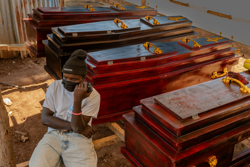Congo curtails funeral wakes in Ebola outbreak as WHO upgrades risk assessment