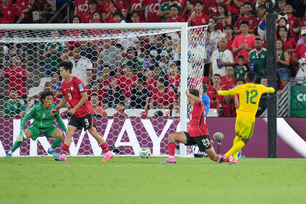 South Africa reaches World Cup knockout round for 1st time with 1-0 win over South Korea