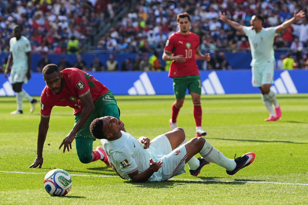 Kylian Mbappé scores his 8th World Cup goal before leaving game with a ‘slight’ ankle injury